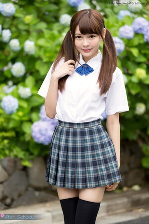 Tiny Asian schoolgirl strips and flaunts her bare ass and pussy