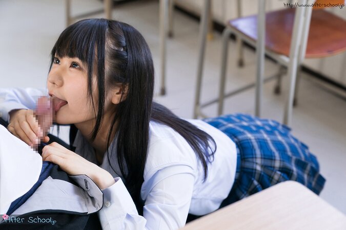 Sexy Asian schoolgirl exposes her tight ass in the classroom