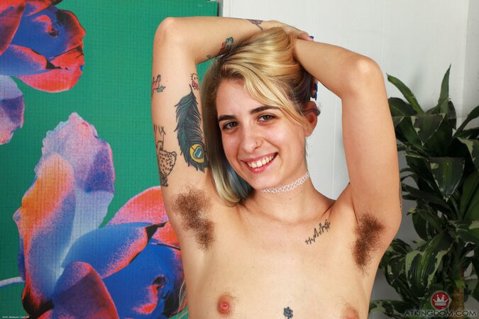 Inked blonde embraced her bush and would like you to check it out