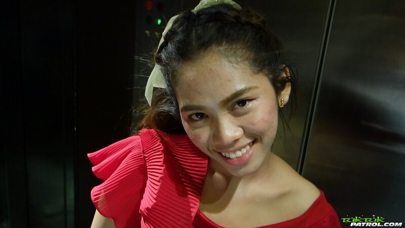 Sweet Thai teen has fun walking with a foreign photographer