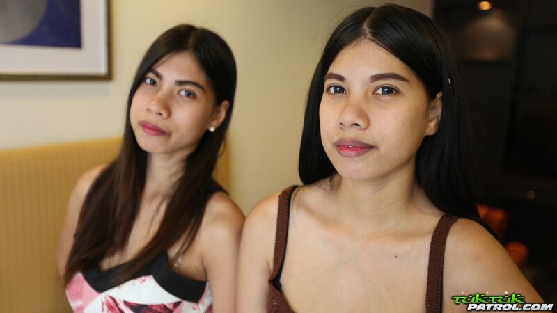 Two totally tight Thai girls strip naked to show it all