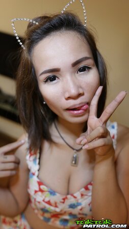 Thai stunner with big naturals exposing her goodies on cam