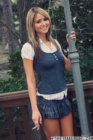 Schoolgirl flashes her ass and looks like a true teaser too