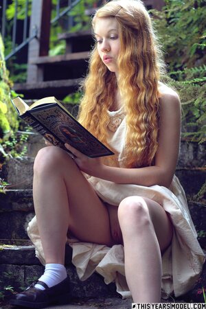 Blonde angelic nymph gets rid of her clothes once she's outdoors