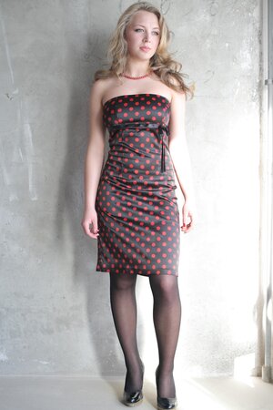 Masha B joyfully rolls her eyes as she shows off her body