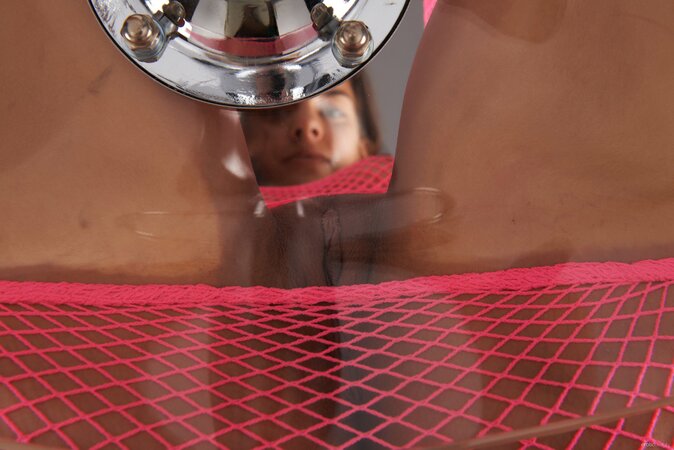 Leggy brunette Red Fox shows her ass and legs in a hot way