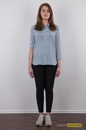 She has a signature boring office style that makes her sexy