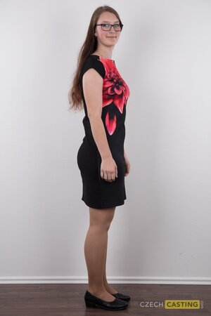 Overjoyed solo girl showing off her meaty ass and natural breasts