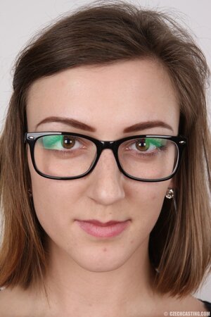 Glasses wearing stunner Vendula shows her boobs and legs
