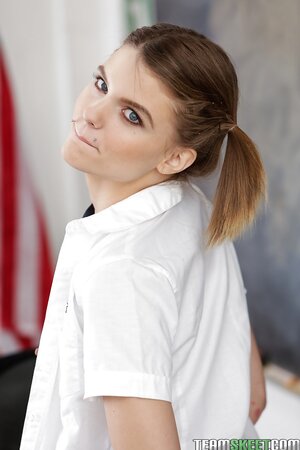 Lassie with pierced belly button Scarlett Fever confidently strips in classroom