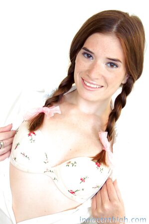 Glorious ginger chick takes a part in a hot solo sex video showing off back door