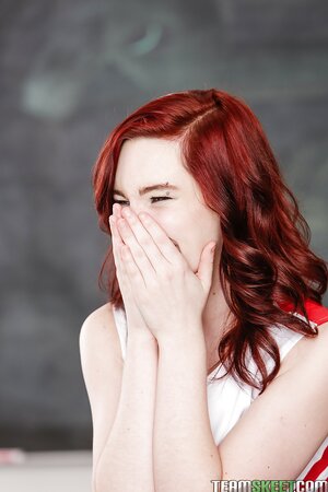 Teen and raunchy redhead schoolgirl gets pleasure stripping on teacher's table