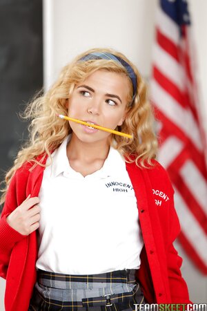 Curly teen puts pink young cunt in camera holding a pencil in her teeth