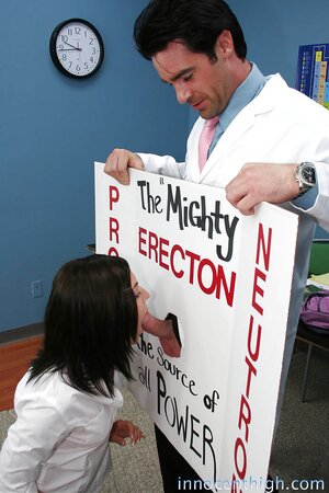 Brunette student gags on teacher's manhood through improvised gloryhole