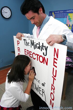 Brunette student gags on teacher's manhood through improvised gloryhole