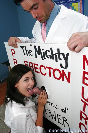 Brunette student gags on teacher's manhood through improvised gloryhole