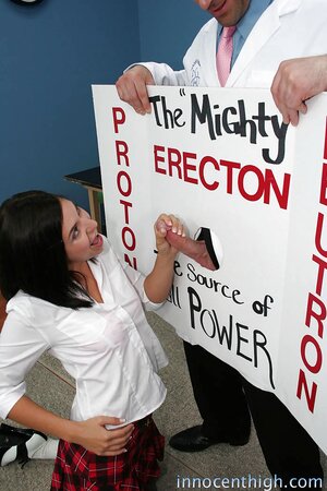 Brunette student gags on teacher's manhood through improvised gloryhole