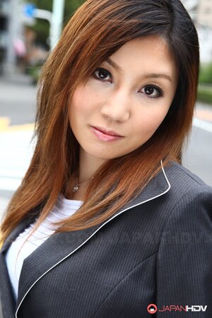Asian female Yuria Kanno with red hair got excited and went out in sexy clothes