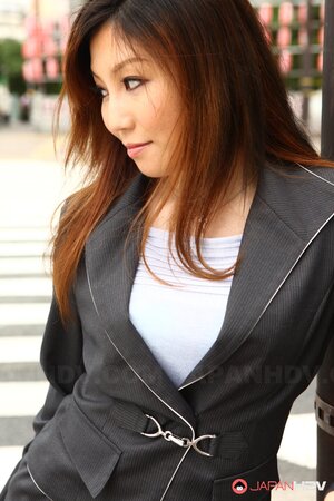 Asian female Yuria Kanno with red hair got excited and went out in sexy clothes