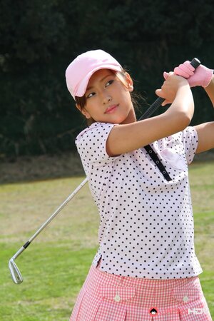 Oriental golf girl wears shirt and skirt but dislikes panties and flashes muff