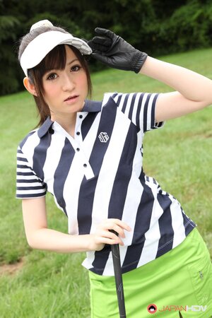 Asian cutie combines playing golf with flashing her panties hidden under skirt