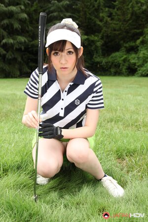Asian cutie combines playing golf with flashing her panties hidden under skirt