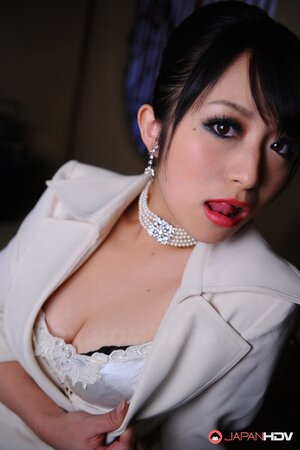 Captivating model from Japan teases cameraman with her seductive cutout