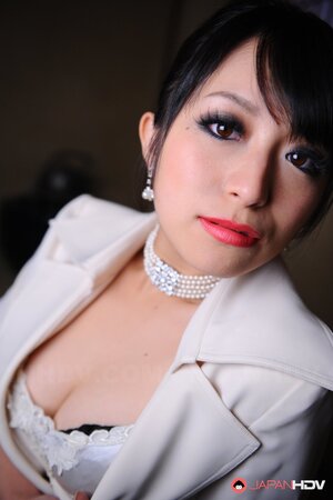 Captivating model from Japan teases cameraman with her seductive cutout