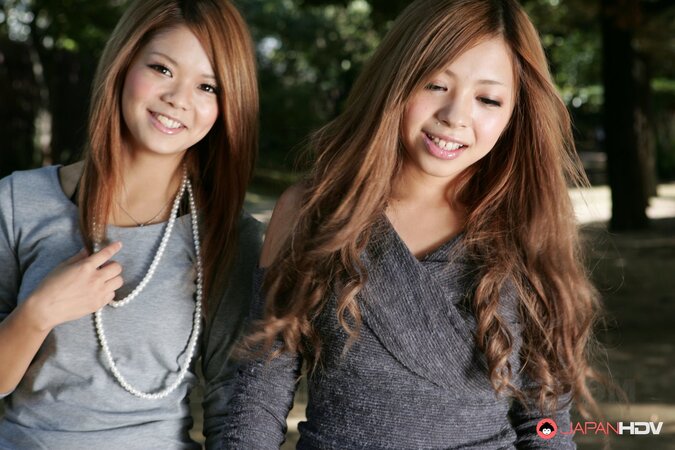 Japanese schoolgirls Tsubasa and Kanon are making out in public