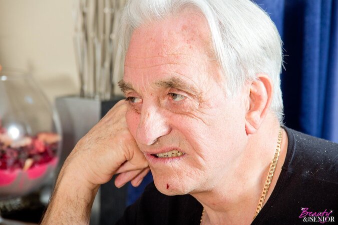 Redhead teases two aging men and they end up rocking her twat