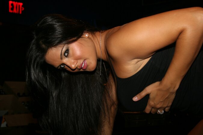 Sunny Leone shows off her big tits while playing with her girlfriend