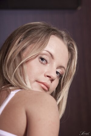 Blonde Hungarian cutie Vanda Lust enjoys unveiling her hot natural titties