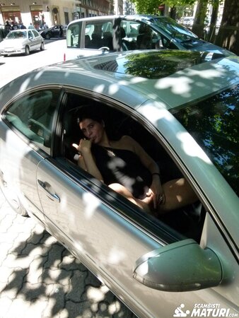 Gianna Michaels enjoys a car ride after getting a mouthful of cum with Sandra M