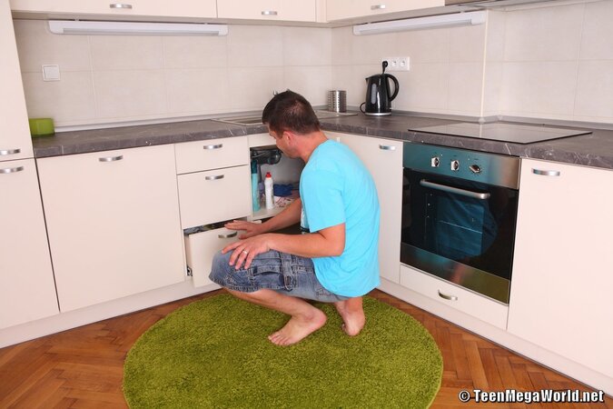 Karina E lures her mom's BF into a hardcore fuck in the kitchen