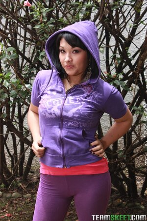 Sporty Hispanic girl showing off her round ass and natural tits
