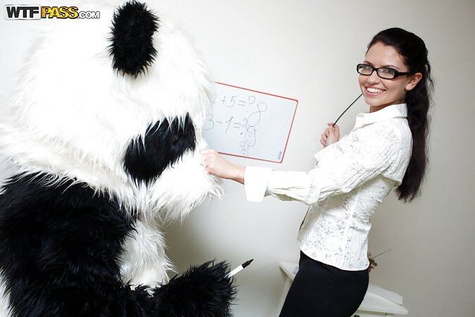 Naughty teen in glasses rides panda toy in stockings and heels