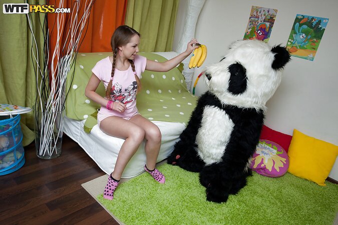 Seductive pigtail teen has fun with big panda toy