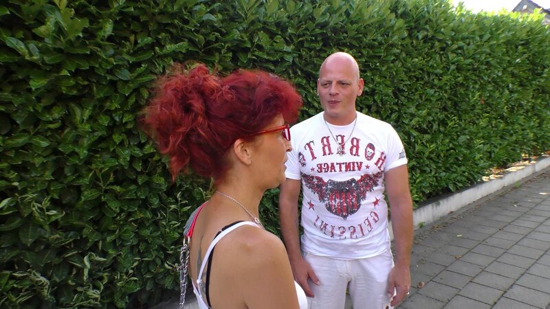 Mature redhead Evelyn S gets penetrated deep by a bald man right on the grey sofa