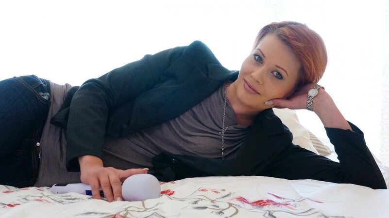 Short hair, classy European redhead fingers herself hard