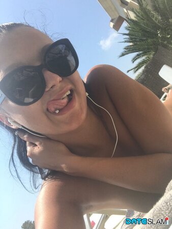 Daphne Klyde takes naughty selfies of her naked ass and tiny tits