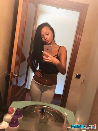 Daphne Klyde takes naughty selfies of her naked ass and tiny tits