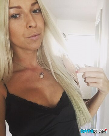 Slovenian blonde mommy displays her tight cleavage and more