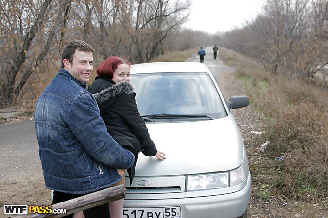 Red-haired bitch in nylons and jacket sucks dick and fucks on a cold day outdoors