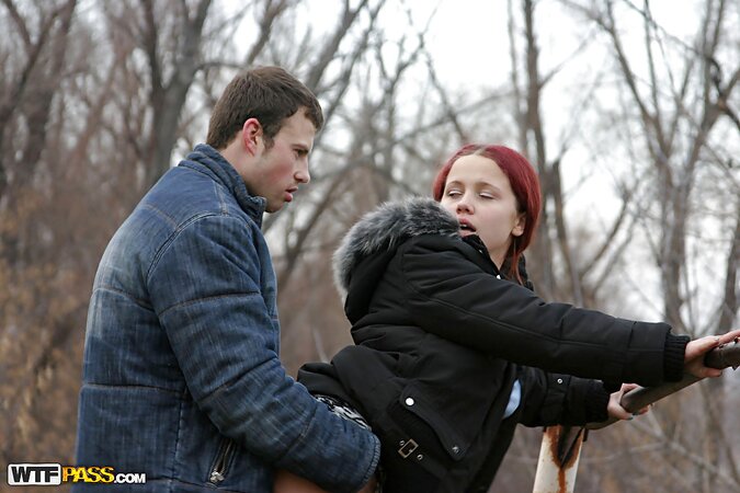 Red-haired bitch in nylons and jacket sucks dick and fucks on a cold day outdoors