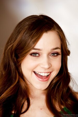 Attractive brunette arrives home and can finally take off her clothes