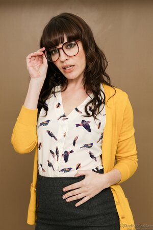 Modest office worker reveals sexy lingerie hidden under her usual outfit