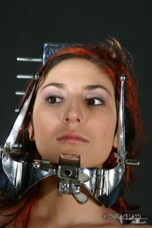 Pretty blonde and her red-haired partner dominated by perverted master