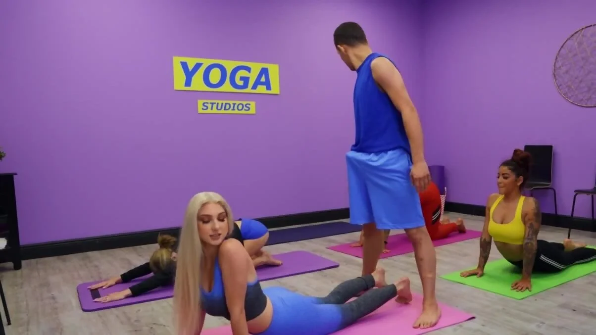 Blonde with natural boobs seduces yoga instructor during lesson photo picture