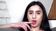 Cute Babe On The Couch Masturbates And Licks Her Fingers