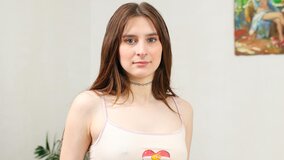 Cute teen brunette with small boobs removes her pants
